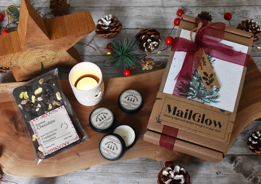 WINTER GLOW MailGlow Gift Box with 6 Tealight Tins, Tealight Holder, Dark Chocolate Bar and Seed Paper Christmas Card